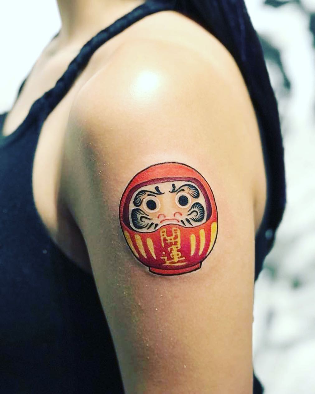 做高尔夫教练的凤先生大臂创意纹身图案